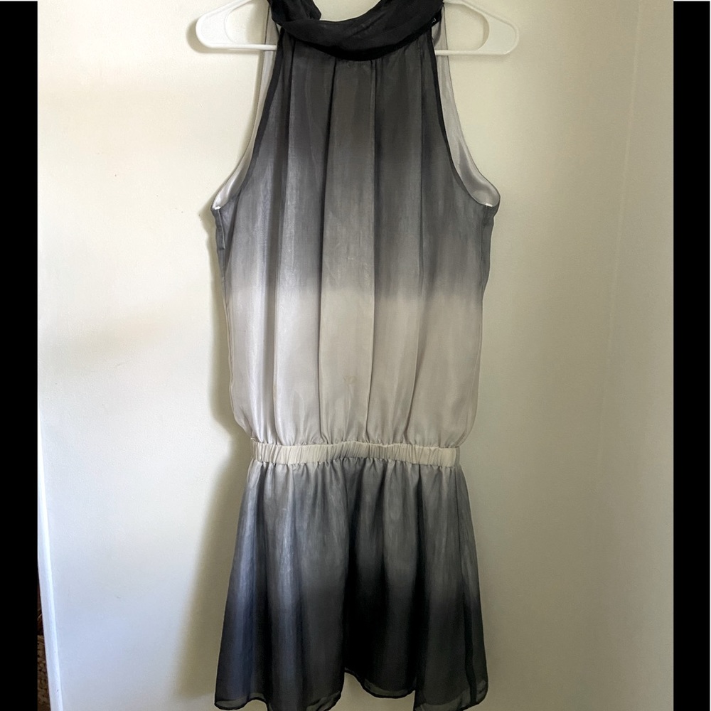 High-end boutique chiffon sleeveless black and white dress.